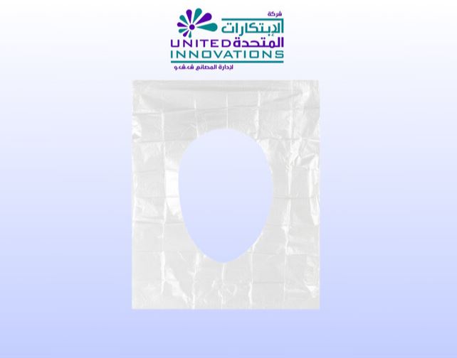 Flushable biodegradable toilet seat cover in use public restroom