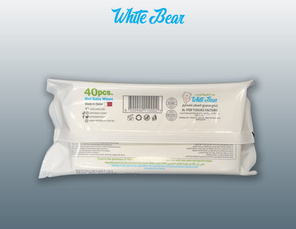 Pulling one White Bear baby wipe from the pack